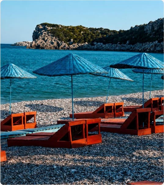 A quiet cove at Çayağzı with loungers and umbrellas